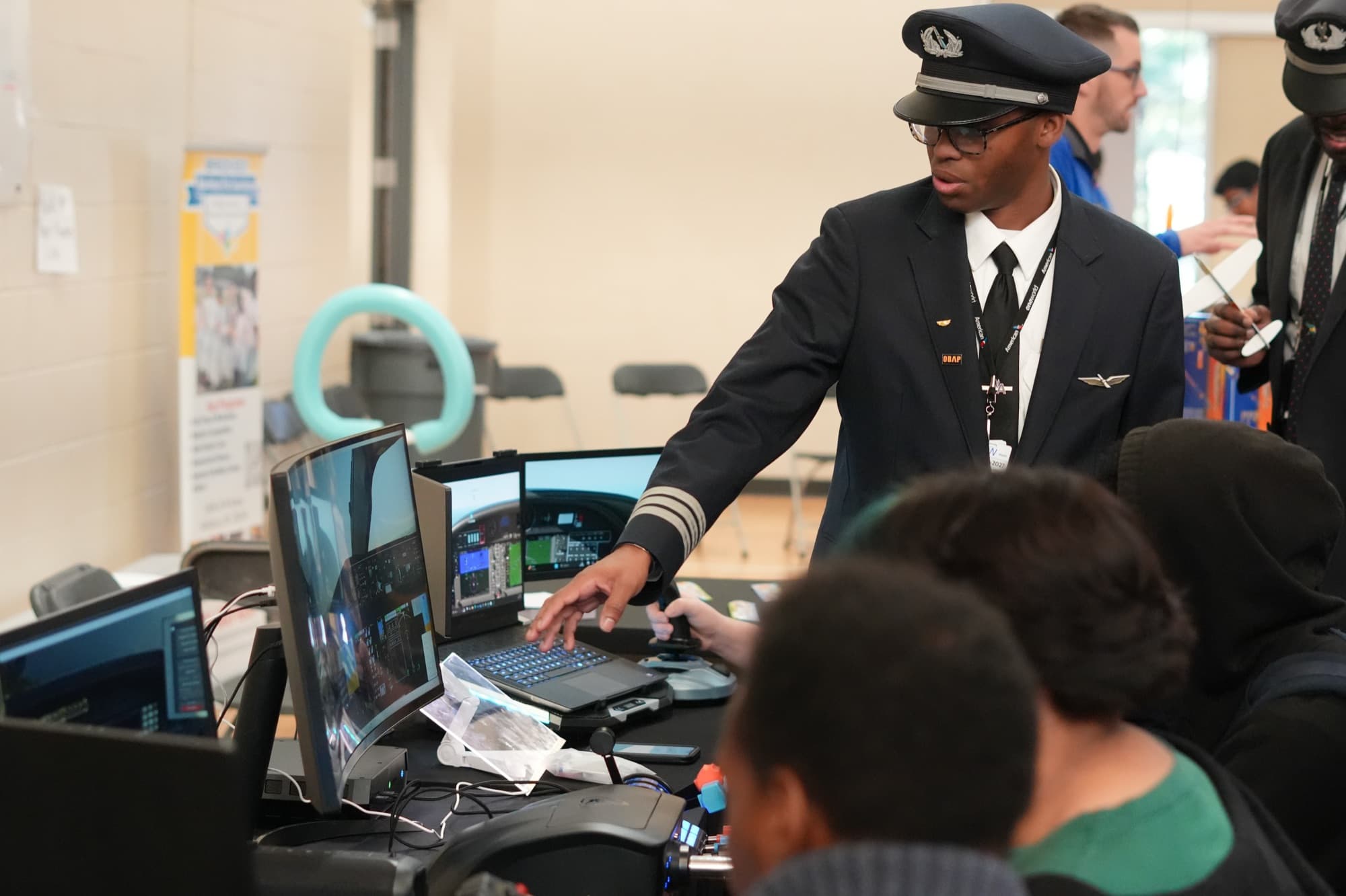 Pilot demonstrating flight simulator